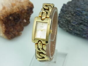 GUESS Slinky W0053L2 Reloj de Mujer Dorado Con Pulsera Enrollable
