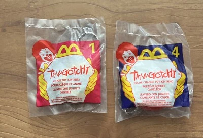 Vinyage LOT 1998 Tamagotchi Keychains McDonalds Toys #1 And #4 NEW Old Stock - Image 1 of 2