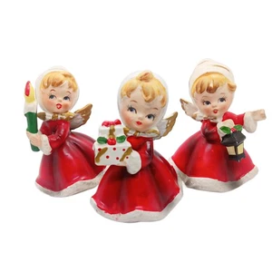 Estatuillas vintage de niña de Navidad NAPCO, comprador, vela, linterna leer descripción - Imagen 1 de 3