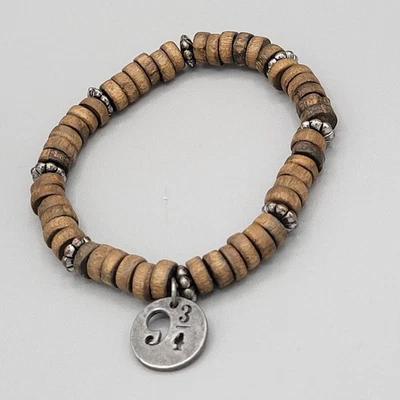 Harry Potter 9 3/4 Plataforma Elástica Pulsera Cuentas Madera Tono Plata Dijes Foto 1 de 4