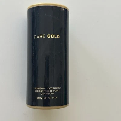 ¡NUEVO!  Polvo corporal brillante AVON - oro raro - 1,4 oz Foto 1 de 3
