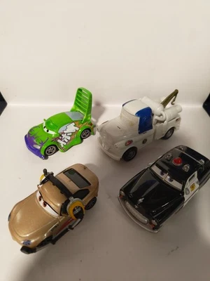 Lot of 4 Disney Pixar Cars Vehicles Race Car Tow Truck Police - Used Toys - Image 1 of 3