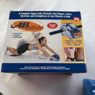 Rueda de entrenamiento de ejercicio con rodillo abdominal deslizable para abdominales como se ve en la televisión Foto 1 de 4