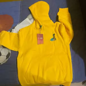 new Apex Legends Nessie Hoodie OFFICIAL Video Game Merch Pullover Clothes Yellow - Picture 1 of 2
