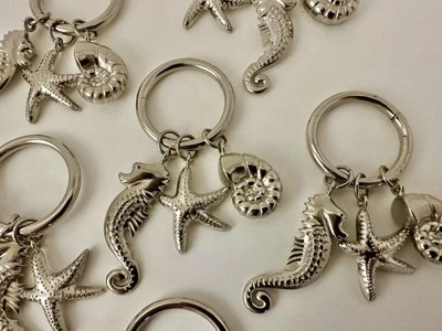 6 ~ Anillos Servilleteros Tono Plata 1.5" Océano Náutico Dijes Caballito de Mar Nautilus Estrella Foto 1 de 3