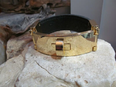 Gold tone CC SKYE Black Leather Turnlock Bangle Bracelet - Image 1 of 4
