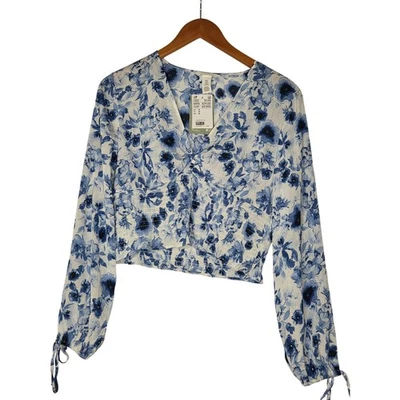 Blusa corta H&M floral con cuello en V blanca azul para mujer talla M Foto 1 de 4