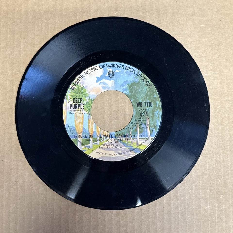 45 об/мин винтажный 7-дюймовый виниловый музыкальный автомат с одним хитом темно-фиолетовый дым на воде - Изображение 1 из 1