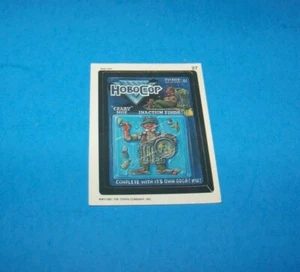 Adesivo Wacky Packages 1991 #27 "Hobo Cop" - Foto 1 di 2