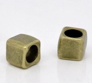 10 cuentas espaciadoras deslizantes de bronce antiguas - 6 mm X 6 mm - cuentas deslizantes de bronce envejecido - Imagen 1 de 2