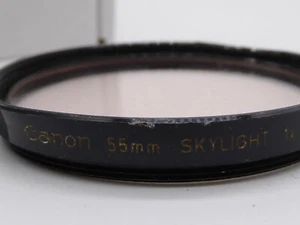 Canon 55mm Skylight 1x Camera Lens Filter optics still great slight damaged rim - Picture 1 of 5