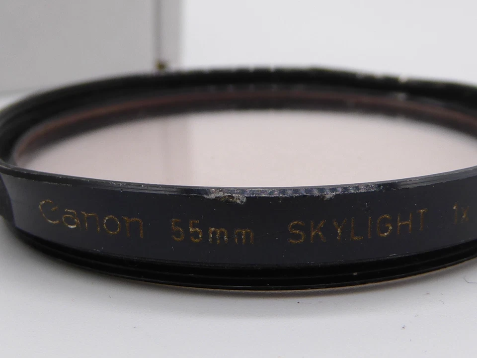 Canon 55mm Skylight 1x Camera Lens Filter optics still great  slight damaged rim - Image 1 of 4
