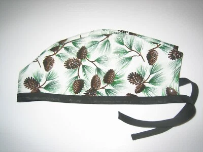 Sombreros Exfoliantes Quirúrgicos Gorras Invierno Ramas de Pino con Piñas y Brillos Corbata Negra Foto 1 de 3