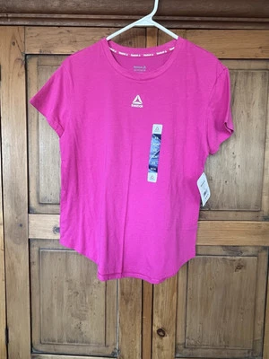 Camiseta atlética nova com etiquetas XS Reebok rosa gola redonda - Imagem 1 de 4