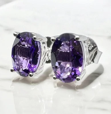 Aretes ovalados de amatista de piedra genuina de 7x5 mm de 2,8 quilates en total de plata de ley 925 Foto 1 de 4