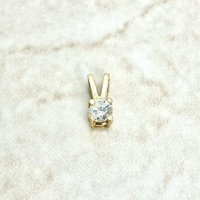 Маленький кулон из чистого 14-каратного желтого золота с одним натуральным бриллиантом 0,10 карата - Изображение 1 из 4