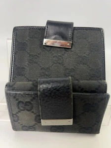 Cartera y llavero Gucci GG de cuero con monograma de lona - Imagen 1 de 8
