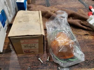 MITSUBISHI GENUINE PARTS LAMP KIT PART # MC848005. - Picture 1 of 3