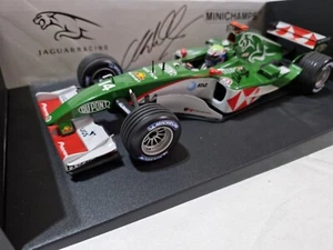 COA SIGNED MINICHAMPS JAGUAR RACING R5 MARK WEBBER 1:18 NEW UNUSED - Picture 1 of 5