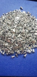 1.5 LBS NEW 1/8"(.125) WIDE X .210" FLAT HEAD SOLID STEEL RIVETS APPROX. 975 - Picture 1 of 4