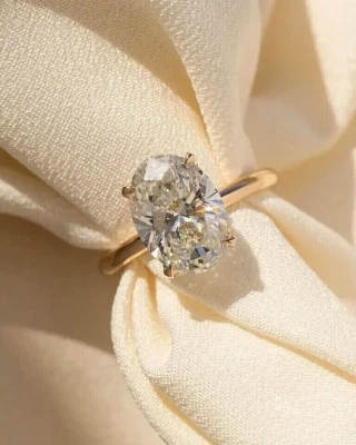 Anillo de compromiso solitario de diamantes cultivados en laboratorio VS2/H talla ovalada de 3,00 quilates de oro rosa de 14 k Foto 1 de 4