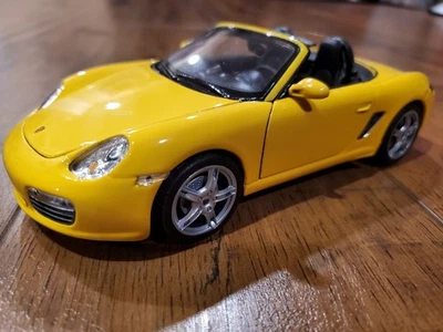 WELLY PORSCHE BOXSTER S CONVERTIBLE 1:24 YELLOW  - Image 1 of 4