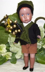 Antike Puppe Irland Schottland kariert mit Sackpfeifen - Bild 1 von 3