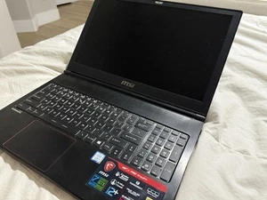 MSI GS63 7RD Stealth 15.6” Gaming Laptop, i7 7700HQ, GTX 1050, 16GB RAM, 1TB  - Picture 1 of 12