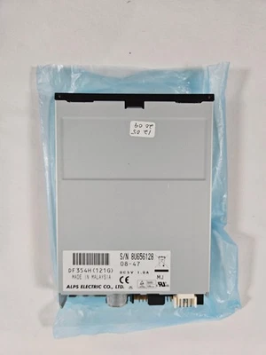 Unidad de disquete vintage Alps Electric Co 3,5" 1,44 MB nuevo stock antiguo Foto 1 de 3