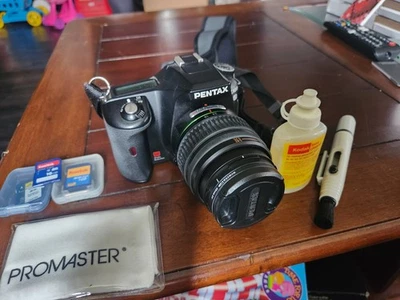 Pentax K100D Digital SLR Camera with 18-55mm Lens Black With Case And Extras - Image 1 of 4