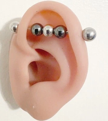 CINCO LONGITUDES: Bolas de piedra de hematita de acero quirúrgico 316L barra industrial de 14 g. Foto 1 de 4