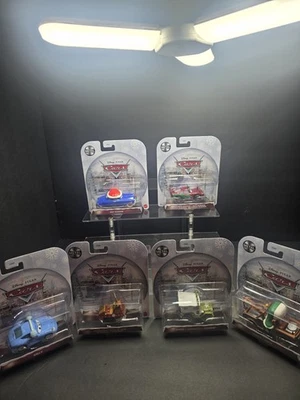 DISNEY PIXAR CARS. HOLIDAY CHRISTMAS SET OF 6  CARS FROM 2025 CASES. NEW STOCK! - Image 1 of 4