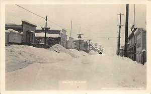 Valdez AK Snowy Street View Store Fronts, in 1916 RPPC Postcard - Picture 1 of 2