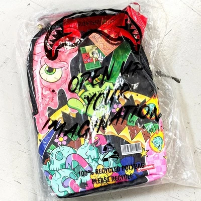 *NUEVA* MOCHILA SPRAYGROUND Monster Money DLXV MULTI (B8305) 👍 Foto 1 de 4