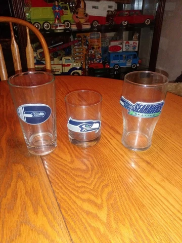Lot Of (3) Seattle Seahawks drinking Glasses Great American Products Logos Cover