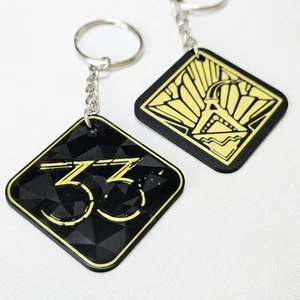 Clair Obscur: Expedition 33 Keychain Keyring - Picture 1 of 4