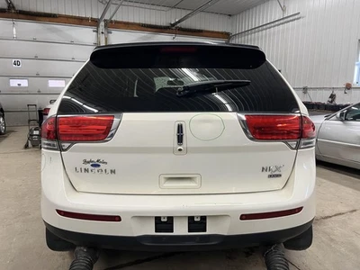 11-15 CUBIERTA PARACHOQUES TRASERO LINCOLN MKX CON ASISTENCIA DE ESTACIONAMIENTO CRISTAL PINTURA CHAMPAGNE JZ Foto 1 de 4