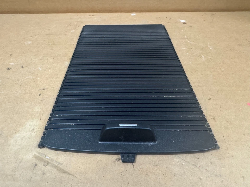 07-17 Acadia Enclave Travesa Consola Central Puerta Corredera Cubierta Tapa Rollo Foto 1 de 4