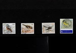 STAMPS SWITZERLAND BIRDS 4 DIFFERENT STAMPS USED - Picture 1 of 2