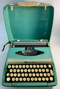 Macchina da scrivere portatile Smith-Corona Vintage Corsair SCM in custodia, blu/acqua, testata - Foto 1 di 14