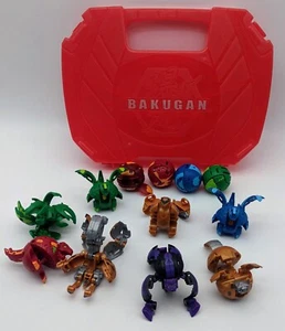Bakugan Konvolut 12 Teile + rote Tragetasche Spin Master - Bild 1 von 1