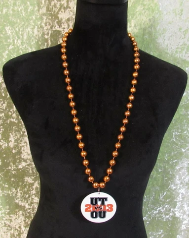 Necklace with Orange Beads & a UT vs OU 2003 Pendant Cover