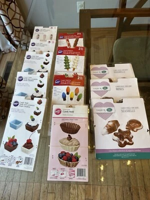 Lot of 12 NEW Candy Molds, Wilton & Make N’ Mold Packages - Image 1 of 4