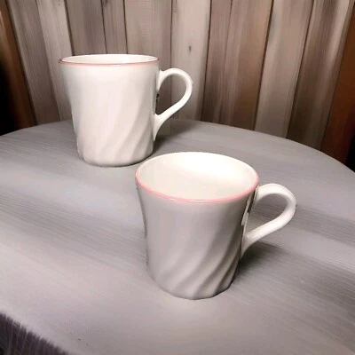 Juego de 2 tazas de café vintage CORNING CORELLE blanco remolino borde rosa EE. UU. Foto 1 de 4