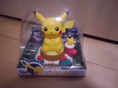 TOMY Nohohon Zoku Hidamari no Tami Pokemon Pikachu tipo Navidad Bobble Eco Solar Foto 1 de 2