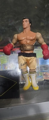 Figura de acción vintage Phoenix Toys Rocky Balboa 6,5 pulgadas con guantes y cinturón Foto 1 de 3