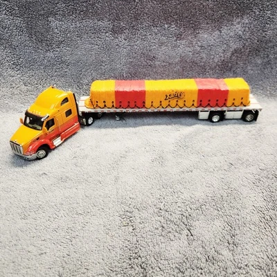 DCP Farley Brothers Peterbilt mit Pritschenanhänger und gedeckter Ladung. #30232. Box - Bild 1 von 4