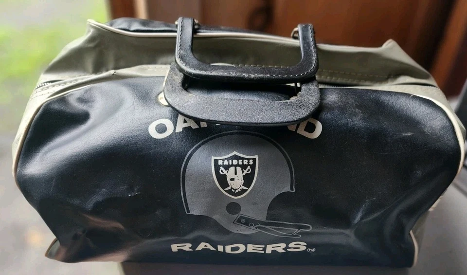 Bolso de Lona Vinilo Oakland Raiders Fútbol Americano NFL Años 70 De Colección - Negro/Plateado Foto 1 de 4