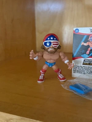 Figura Vinilo Macho Man Randy SAVAGE Loyal Subjects WWE 1/48 con Campana EE. UU. Americana Foto 1 de 3
