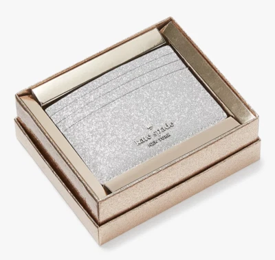 Cartera Kate Spade Glimmer en caja pequeña delgada tarjetera plateada KE448 NUEVA CON ETIQUETAS PRECIO DE VENTA SUGERIDO POR EL FABRICANTE 99 $ Foto 1 de 4